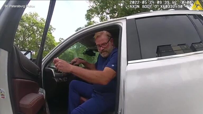 Plastic surgeon Dr. William Wright Adams exiting vehicle policy body cam.